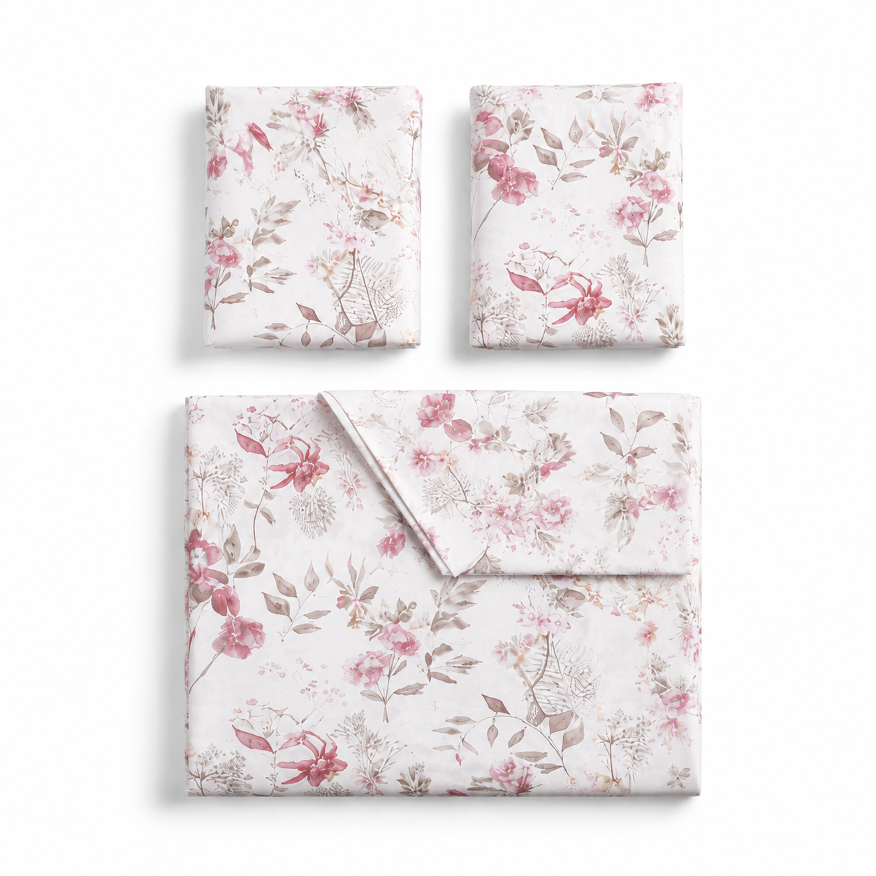 Three folded rectangular fabric pieces with a delicate floral print in pink, red, and muted green on a white background, arranged on a clean white studio background.