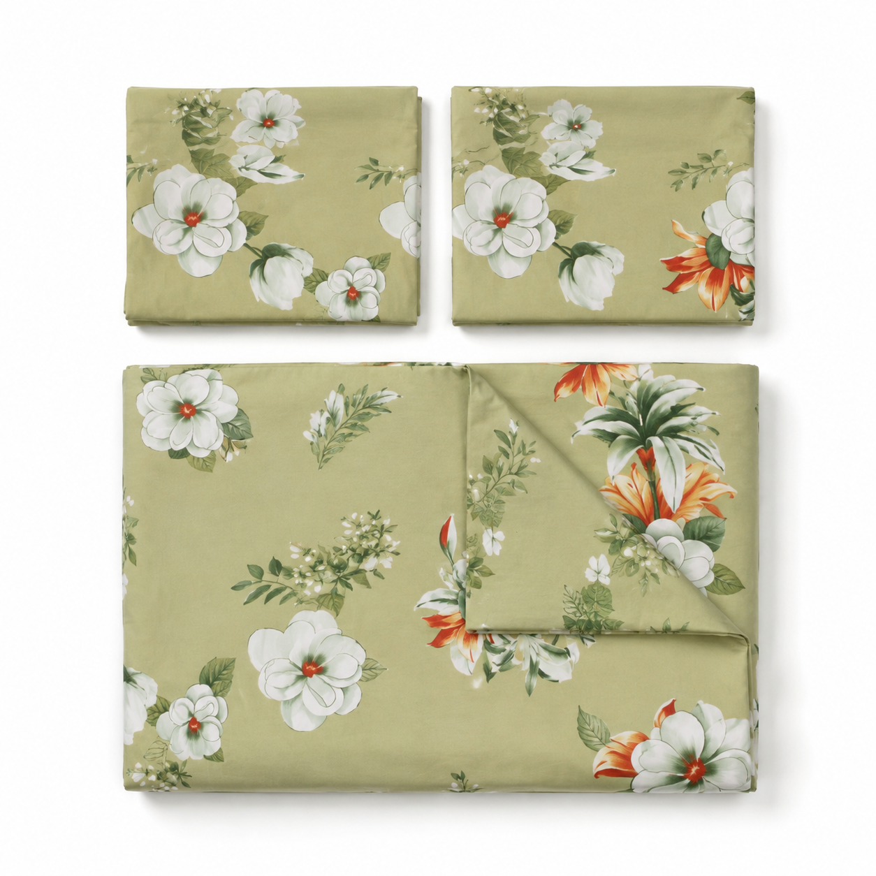 A folded floral fabric set arranged on a white background, featuring a sage green base with white flowers, green leaves, and orange tropical accents.