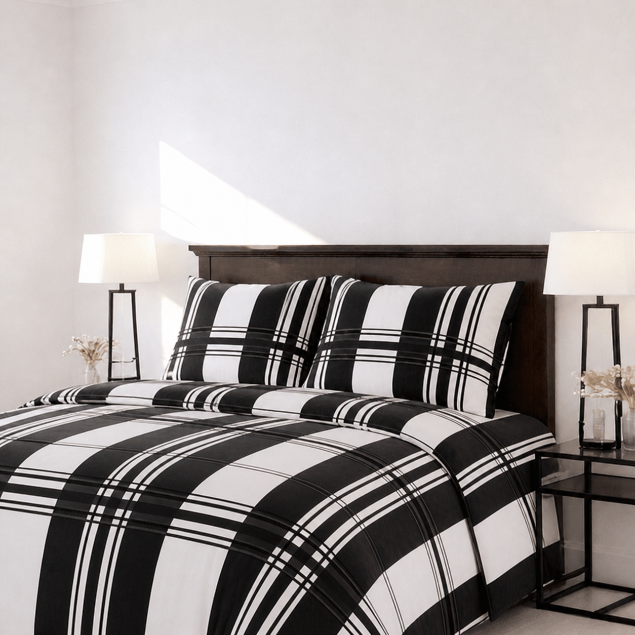Black and White Monochrome Bedding Set on a Bed in a Room