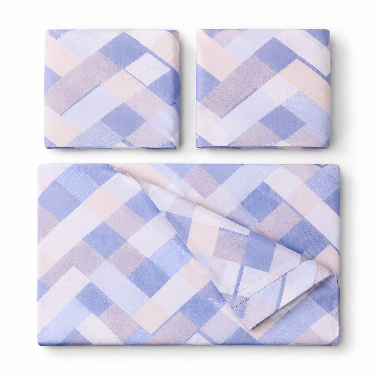 Three folded fabric pieces with a soft geometric diamond pattern in pastel lavender, light blue, and blush pink, arranged on a clean white background.