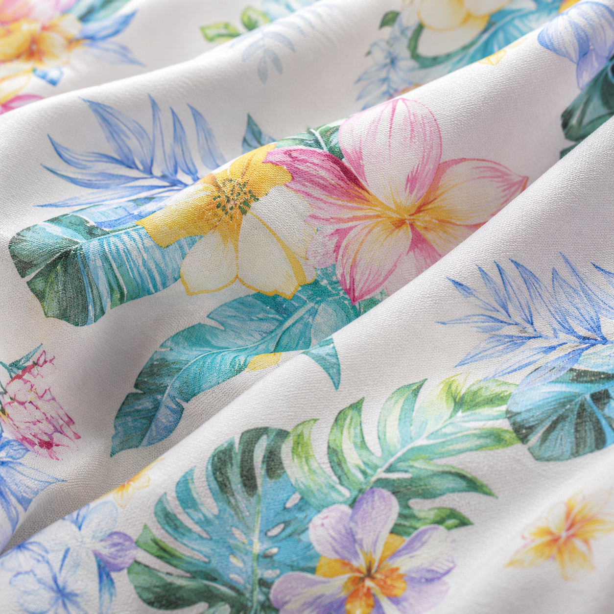 White fabric with a colorful tropical print featuring hibiscus flowers and palm leaves in shades of pink, blue, green, and yellow.