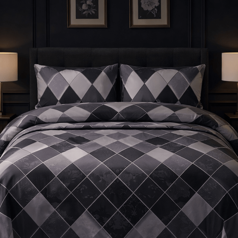 Gray diamond patterned comforter set on a bed in a darkly decorated bedroom.