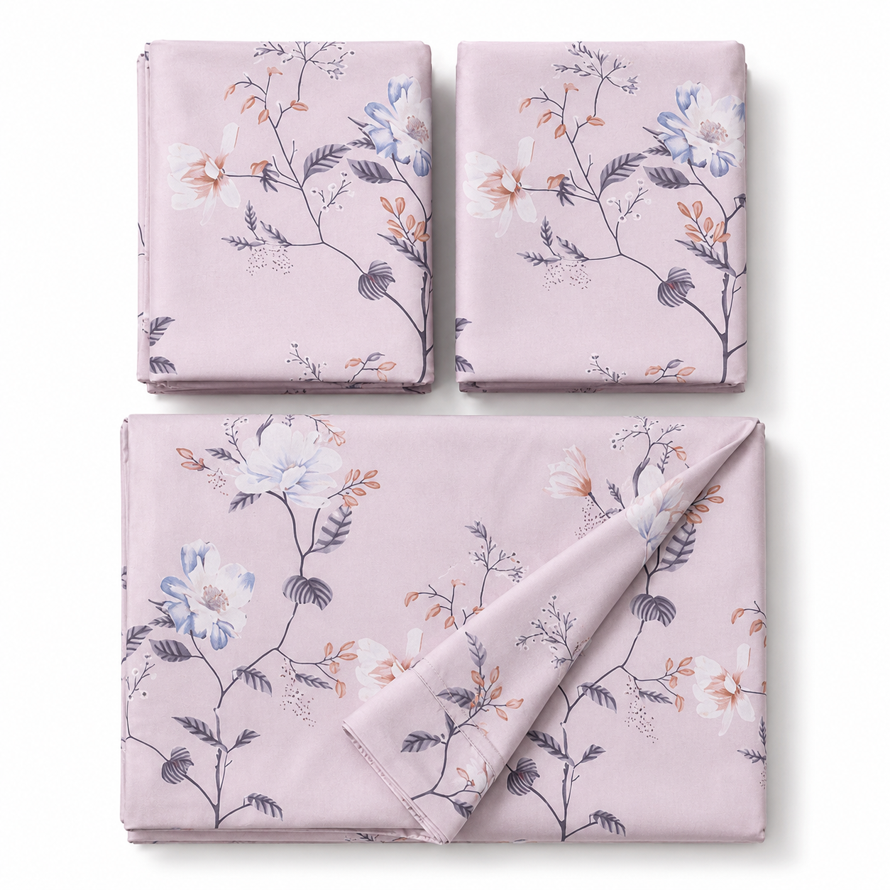 Three folded pieces of dusty pink fabric with a delicate floral print in white, blue, and orange, arranged on a clean white background.