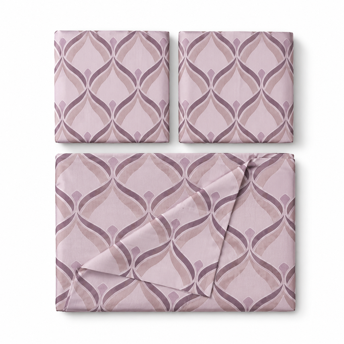 Bed with purple geometric patterned bedding in a bedroom setting.