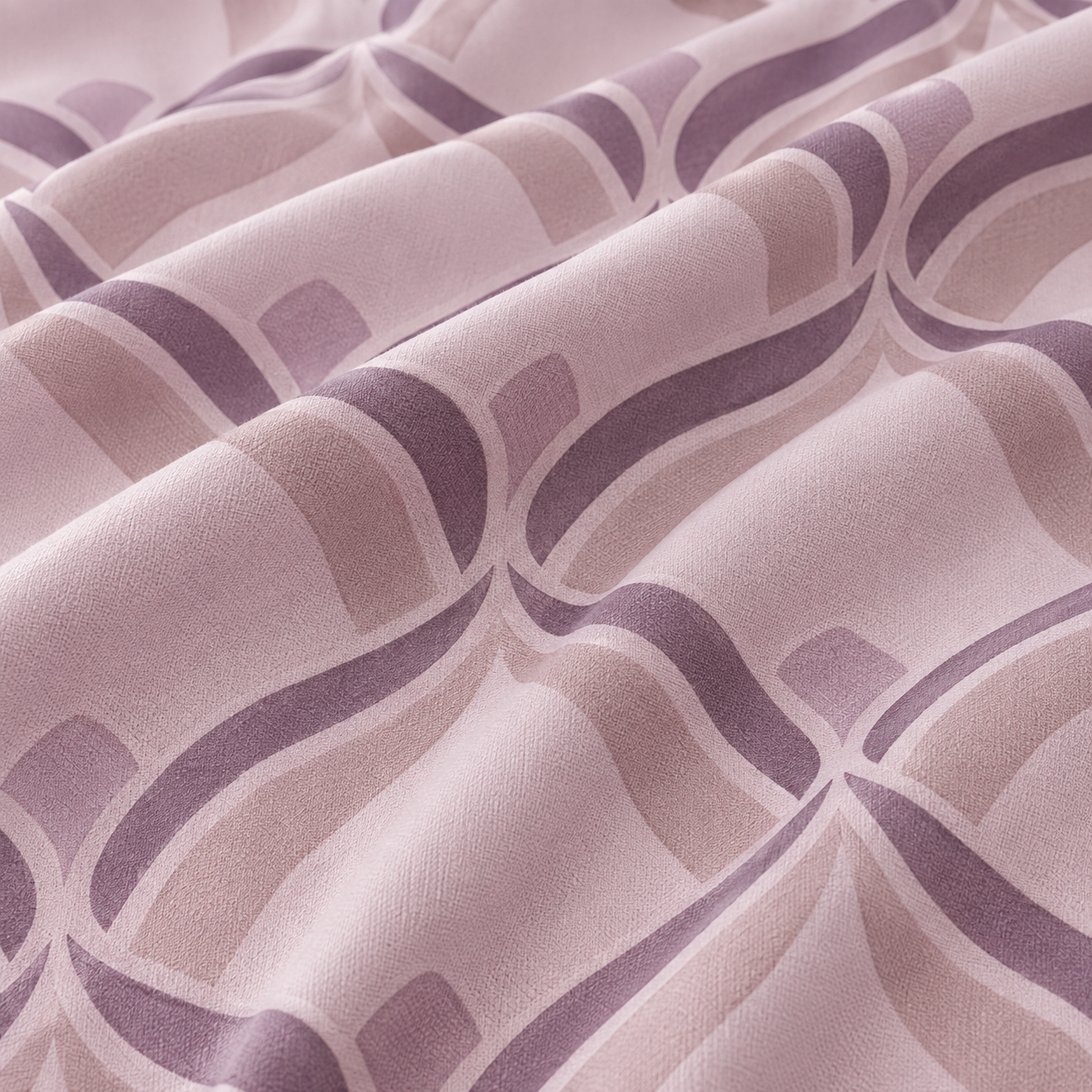 Bed with pink geometric patterned bedding in a bedroom setting.
