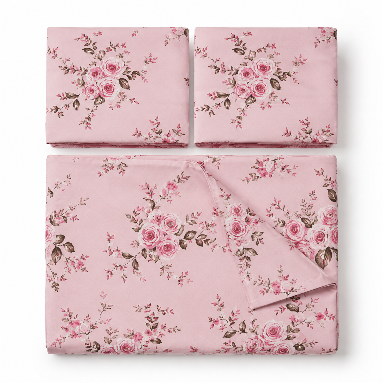 Floral bedding set on a bed in a bedroom with lamps and framed pictures.
