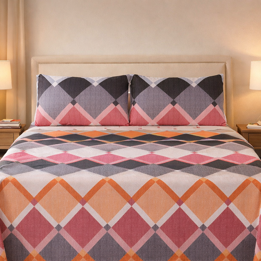 Bedroom with a bed covered in a diamond patterned bedding set.