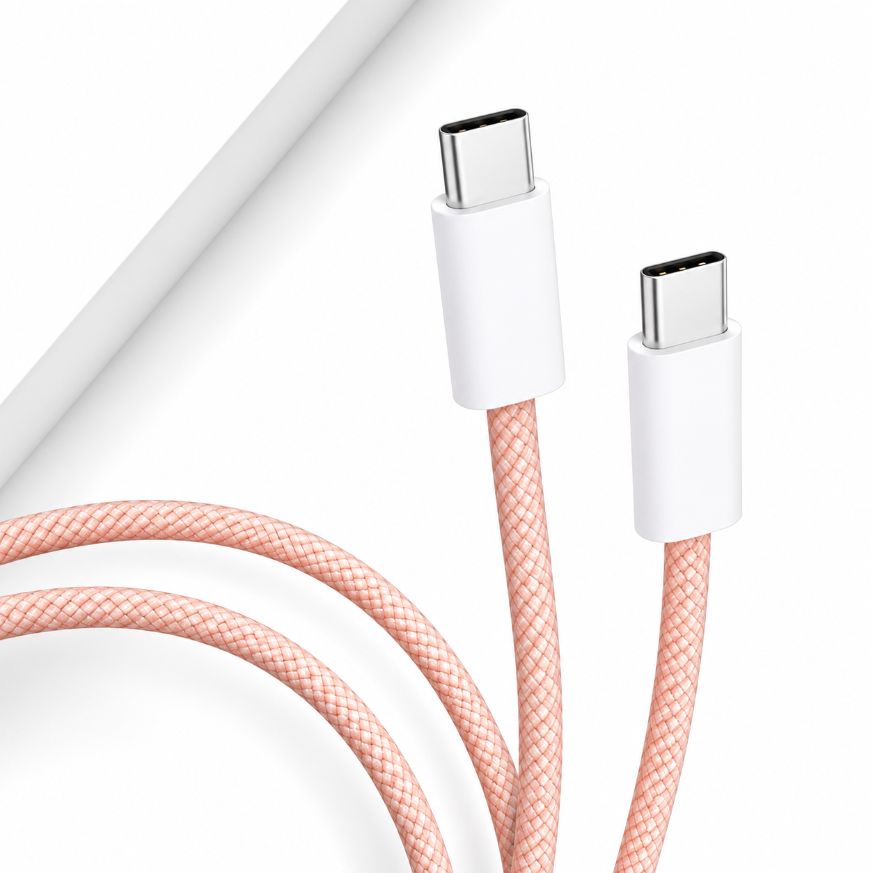 A close-up of a peach braided USB-C to USB-C cable with white connector housings, shown on a clean white background.